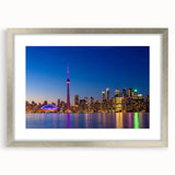 Textured abstract art print in muted blues and greens on canvas, suitable for enhancing a bedroom's ambiance.