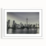 Abstract art print featuring swirling blue and white patterns on canvas, suitable for bedroom or dining room decor.