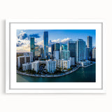 Abstract art print featuring swirling blue and gray tones on a rolled canvas.