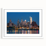 Abstract art print featuring swirling blue and gray tones on canvas, suitable for bedroom or dining room decor.