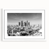 Abstract art print featuring swirling blue and white patterns on canvas, suitable for dining room or bedroom decor.