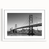 Abstract art print depicting swirling patterns in vibrant orange and blue on a canvas.