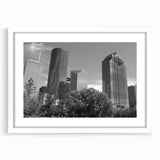 Abstract art print featuring swirling blue and gray tones on a rolled canvas, suitable for modern dining room decor.