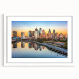 Abstract art print featuring swirling blue and gold tones on a canvas, suitable for dining room or bedroom decor.