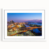 Abstract art print featuring swirls of blue and green on canvas, suitable for bedroom or dining room decor.