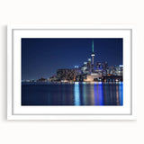 Abstract art print featuring swirling blue and grey tones on canvas, suitable for modern bedroom or dining room decor.