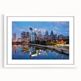 Abstract art print in vibrant orange and blue tones on rolled canvas, suitable for dining room decor.