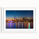 Abstract art print featuring swirling blue and grey tones on a framed canvas, suitable for dining room or bedroom decor.