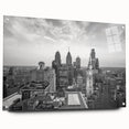 Large abstract wall art on canvas featuring swirling blue and gray tones, ideal for modern bedroom or dining room decor.