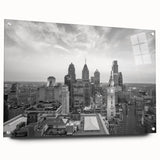 Large abstract wall art on canvas featuring swirling blue and gray tones, ideal for modern bedroom or dining room decor.