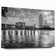 Large abstract wall art featuring swirling blue and grey tones on canvas, suitable for bedroom or dining room decor.
