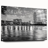 Large abstract wall art featuring swirling blue and grey tones on canvas, suitable for bedroom or dining room decor.