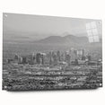 Large abstract wall art featuring swirling blue and gray tones on canvas, suitable for bedroom or dining room decor.