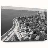 Large abstract wall art on canvas featuring swirls of blue and gold, suitable for bedroom or dining room decor.