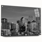 Large abstract wall art featuring swirling blue and gray tones on canvas, suitable for bedroom or dining room decor.