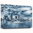 Large abstract wall art featuring swirling blue and white patterns on canvas, suitable for bedroom or dining room decor.