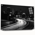 Large abstract wall art featuring swirling blue and gray tones on canvas, suitable for bedroom or dining room decor.