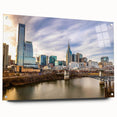 Large abstract wall art featuring swirling blue and gray tones on canvas, suitable for bedroom or dining room decor.