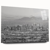 Large abstract wall art featuring swirling blue and gray tones on canvas, suitable for bedroom or dining room decor.