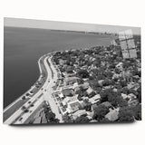 Large abstract wall art print on canvas featuring swirling blue and gray tones, ideal for bedroom or dining room decor.