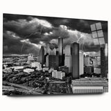 Large abstract wall art featuring swirling blue and gray tones on a rolled canvas.