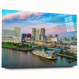 Large abstract wall art in vibrant orange and blue tones on canvas, suitable for bedroom or dining room decor.