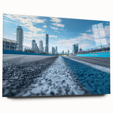 Large abstract wall art featuring swirling blue and gray tones on canvas, suitable for bedroom or dining room decor.