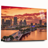 Large abstract wall art in vibrant blue and orange tones on a rolled canvas.