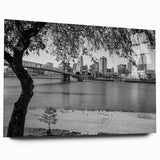 Large abstract wall art featuring swirling blue and gray tones on canvas, ideal for bedroom or dining room decor.