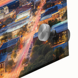 Large abstract wall art in vibrant orange and blue tones on canvas, styled in mid-century modernist design.