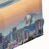 Large abstract wall art in mid-century modernist style with vibrant orange and teal hues, ideal for dining room ambiance.