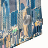 Large abstract wall art in mid-century modernist style, featuring bold orange and teal tones on canvas.