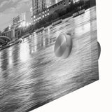 Large abstract wall art in mid-century modernist style, featuring swirling blue and gray tones on canvas.