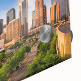 Large abstract wall art featuring swirling blue and orange hues on canvas.