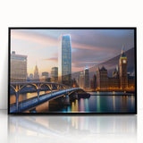 Large abstract wall art featuring swirling blue and gray tones on canvas, ideal for modern living room decor.