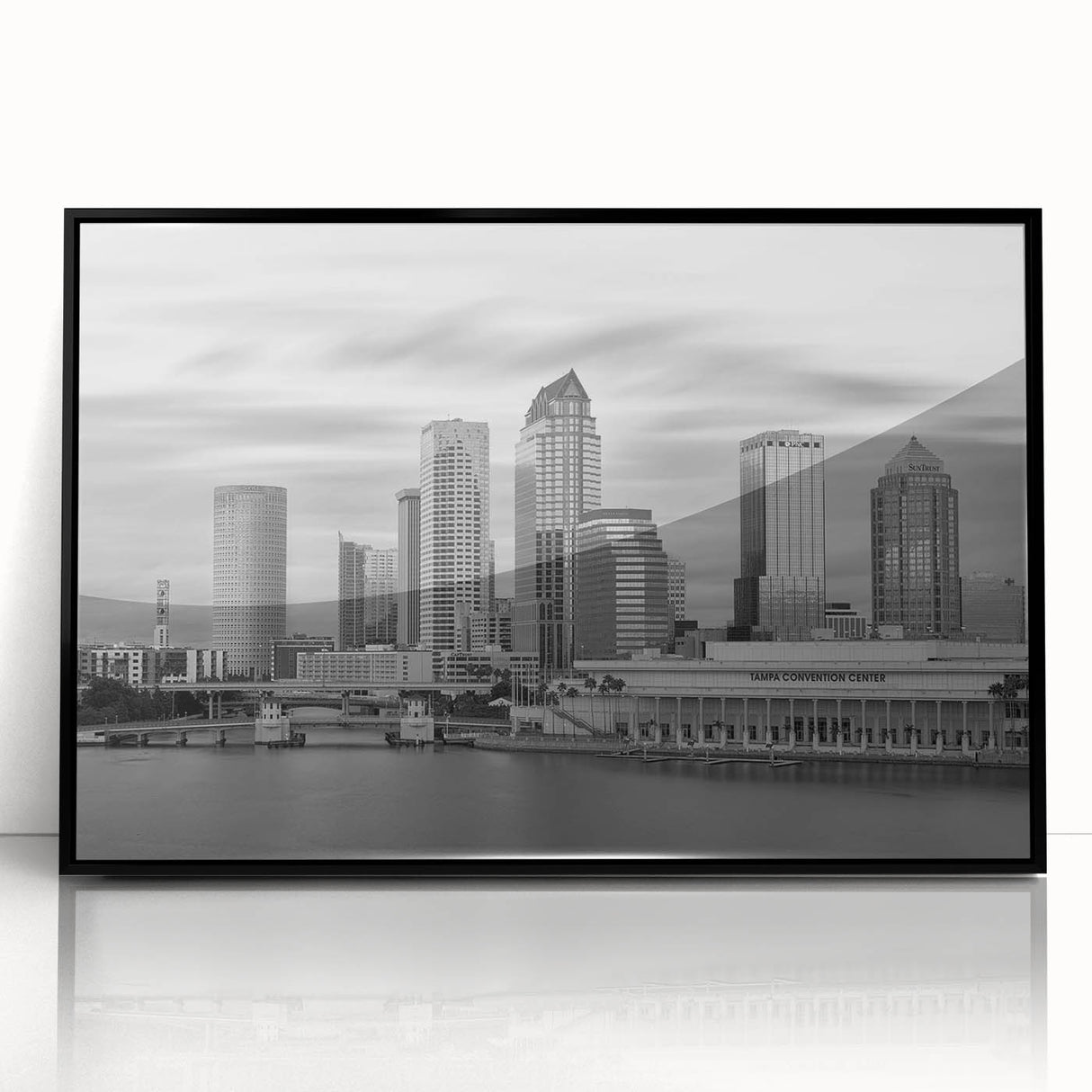 Large abstract wall art featuring bold geometric shapes in earth tones on canvas, suitable for modern living room decor.