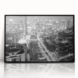 Large abstract wall art featuring swirling blue and gray tones on canvas, suitable for modern living room decor.
