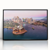 Large abstract wall art featuring swirling blue and gray tones on canvas, ideal for modern living room decor.