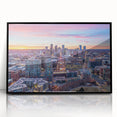 Large abstract wall art featuring mid-century modernist swirls in muted orange and brown tones.