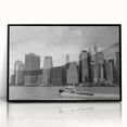 Large abstract wall art featuring swirling blue and gray tones on canvas, ideal for modern living room decor.