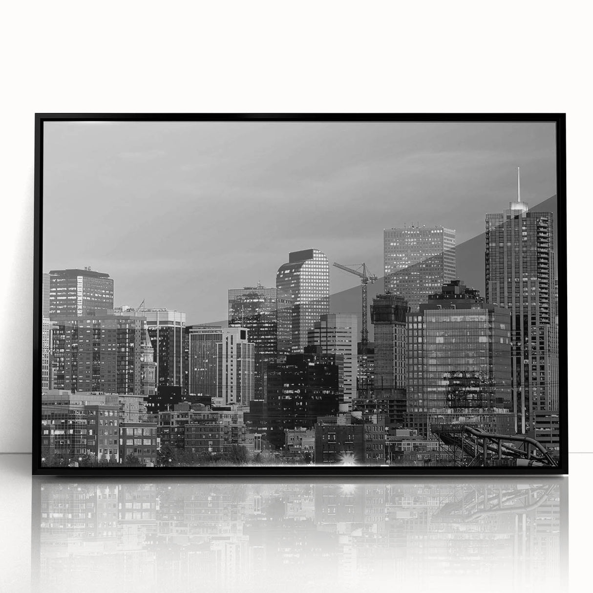 Large abstract wall art featuring swirling blue and gray tones on canvas, reflecting mid-century modernist style.