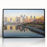 Large abstract wall art featuring swirling blue and gray tones on canvas, in a mid-century modernist style.