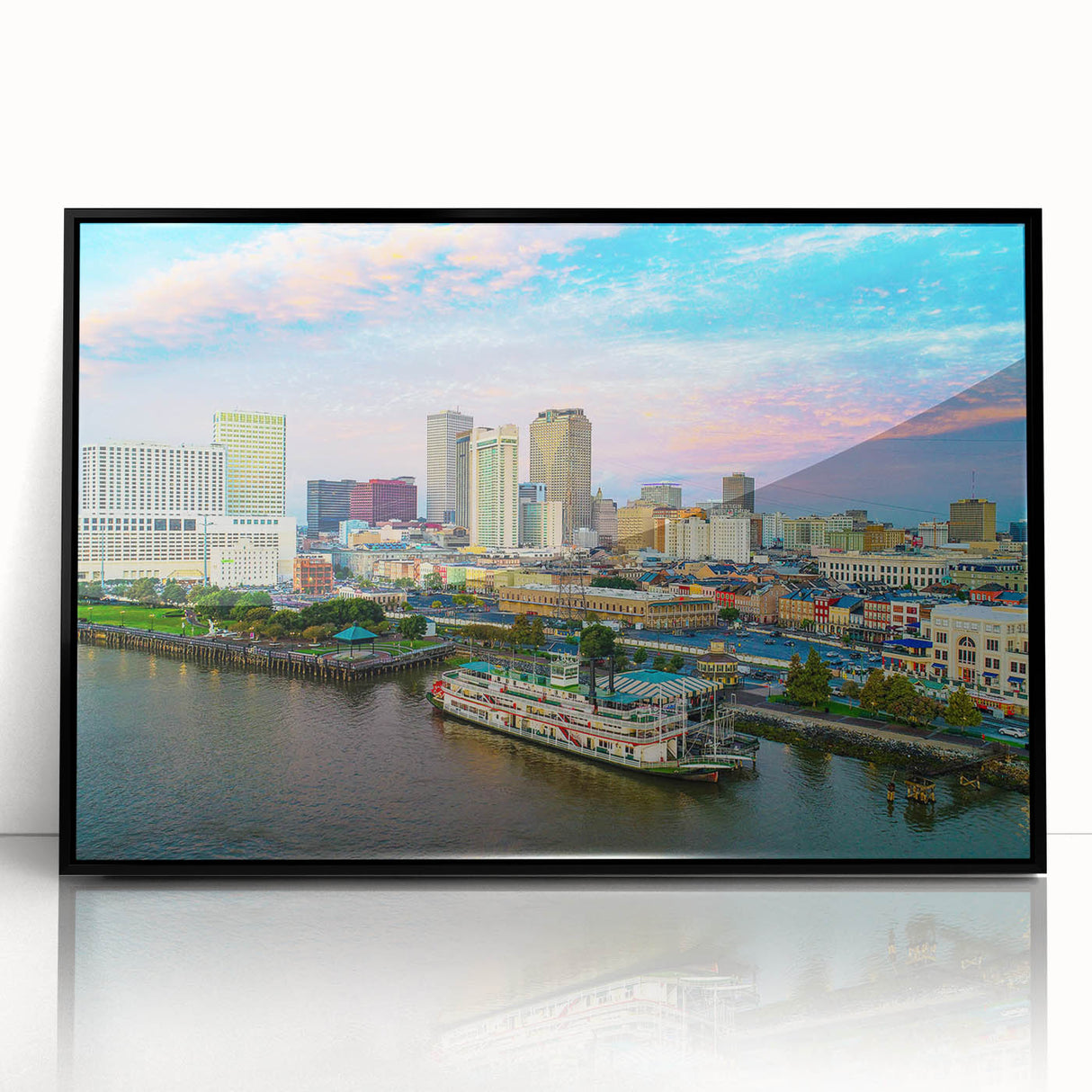 Large abstract wall art featuring swirling blue and gray tones on canvas, ideal for modern living room decor.