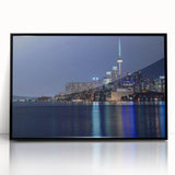 Large abstract wall art featuring swirling blues and oranges on canvas, ideal for modern living room decor.