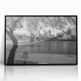 Large abstract wall art on canvas featuring swirling blue and golden hues in a mid-century modernist style.