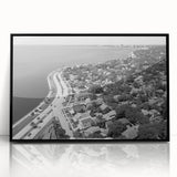 Large abstract wall art featuring swirling blue and gray tones on canvas, ideal for modern living room decor.