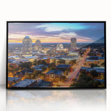 Large abstract wall art featuring swirling blue and gray tones on canvas.