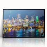 Large abstract wall art featuring swirling blue and green patterns on canvas.