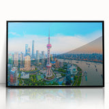 Large abstract wall art print featuring swirling blue and gray tones on canvas, ideal for modern living room decor.