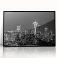 Large abstract wall art featuring swirling blue and gray tones on canvas, ideal for enhancing a modern living room ambiance.